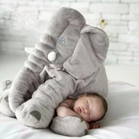 Peluche Brooky™ en forme d'éléphant en coton gris perle pour enfants, adaptée dès 3 mois. Douce et durable, idéale pour les câlins en journée et pour rassurer bébé la nuit. Qualité garantie et facile d'entretien.