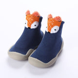 Chaussures CutieShoes™ pour enfants - Modèles premiers pas en coton et caoutchouc, conçues pour épouser la forme naturelle du pied, prévenir les glissades et protéger les orteils. Design mignon avec motifs d'animaux variés, parfaites pour le confort et la sécurité des premiers pas de bébé.