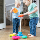 Jeu éducatif SpiralTower™ pour bébés de +12 mois, favorisant la concentration et la coordination œil-main avec disques colorés et spirale, fabriqué en plastique alimentaire sans BPA, sécurisé pour les enfants.